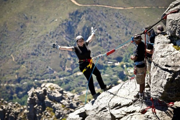 Me in South Africa, belaying off of a mountain, 2012