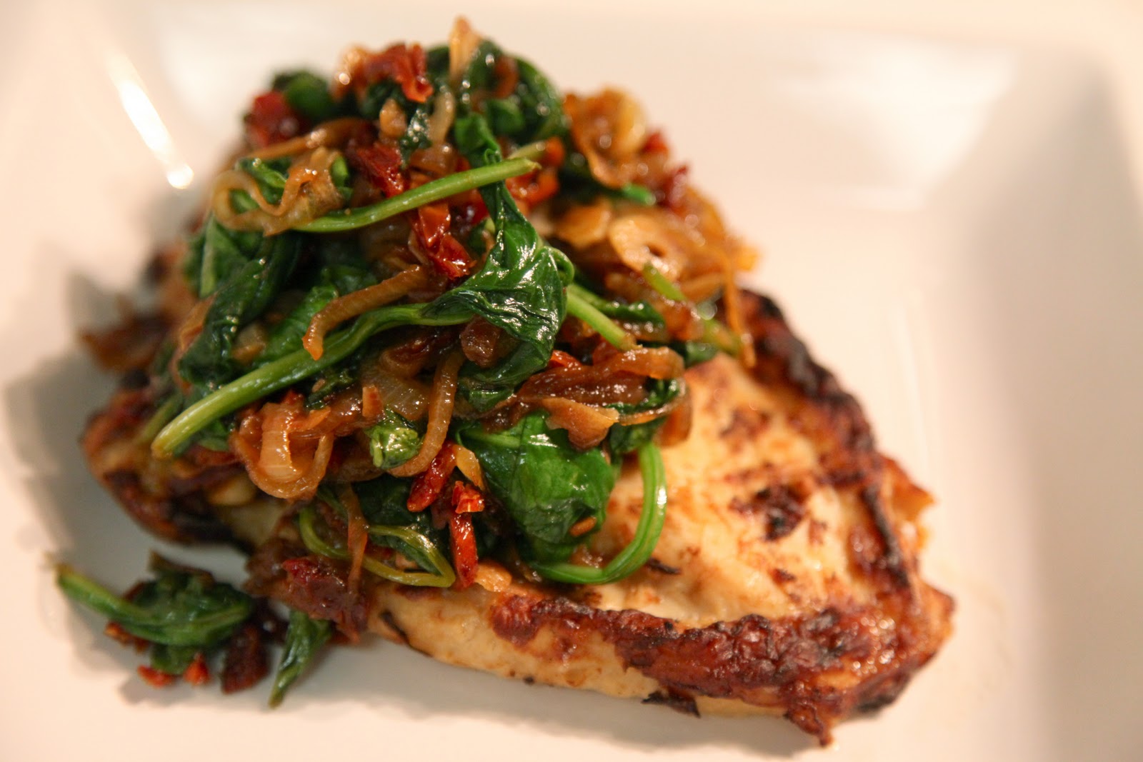 Sauteed Caramelized Onions, Sun-Dried Tomato, Garlic & Baby Spinach over Grilled Chicken – $1.75