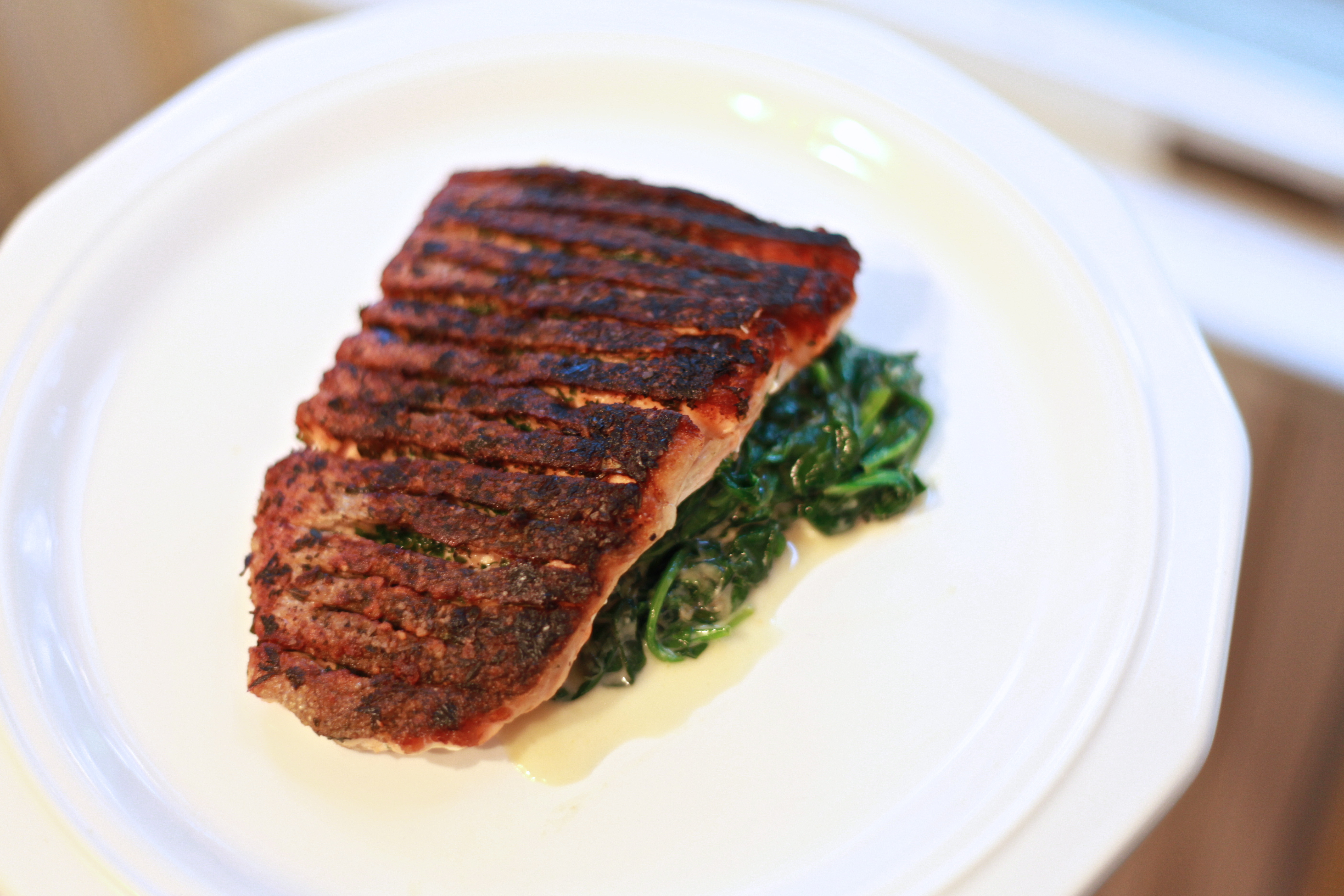 Sauteed Skin-On Herb Salmon over Creamed Spinach – $2.95